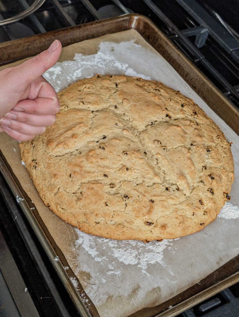 unbaked and baked soda bread loaf